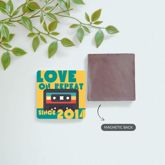 Front and back view of Love on Repeat and custom photo magnets.