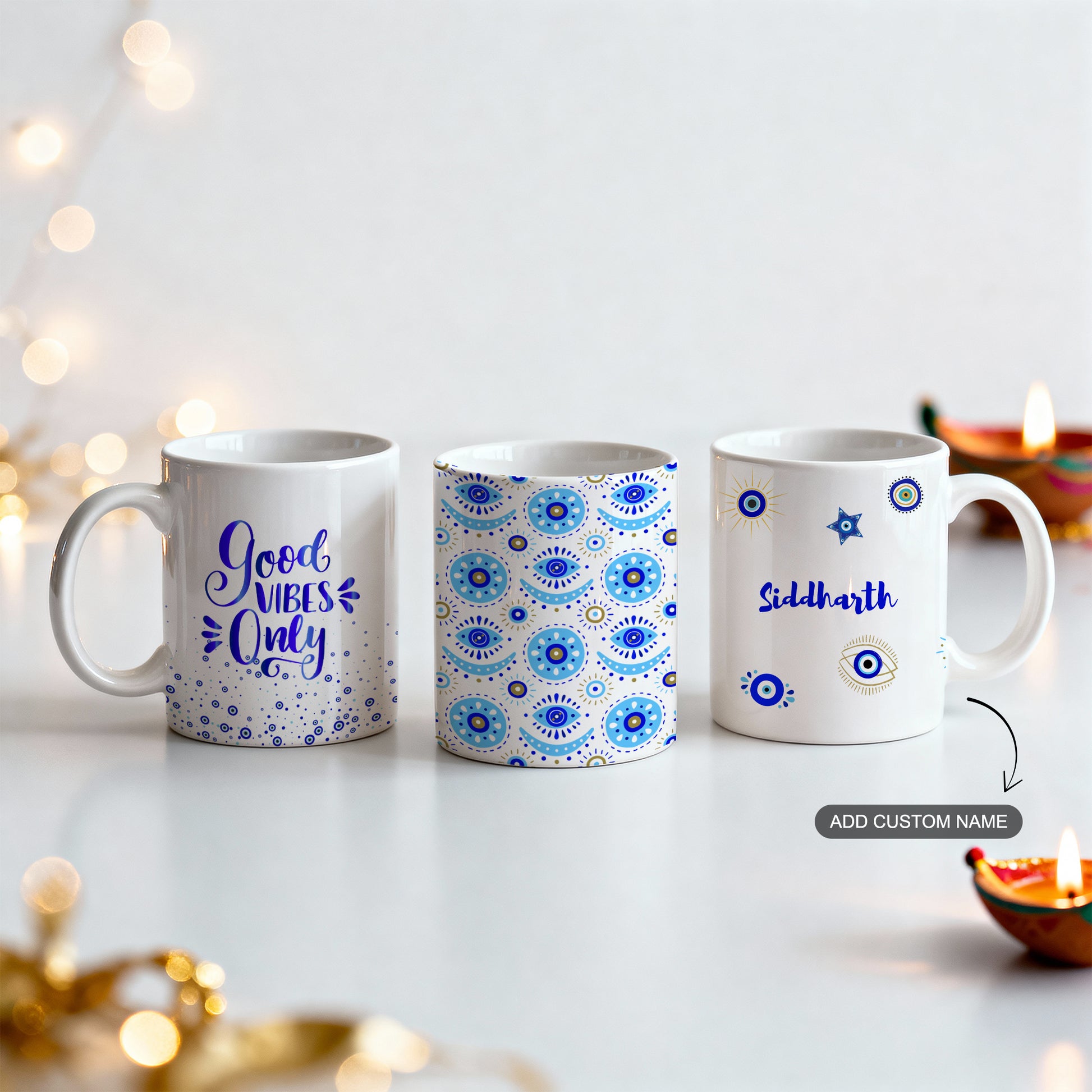 Festive set of 3 white ceramic mugs with evil eye theme and custom name option.