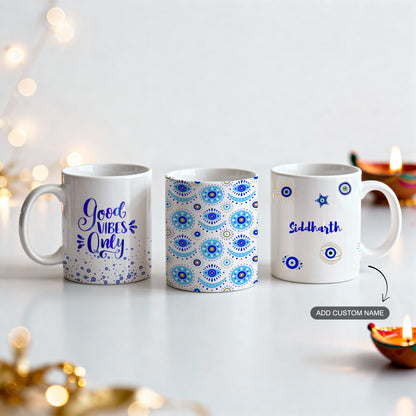 Festive set of 3 white ceramic mugs with evil eye theme and custom name option.