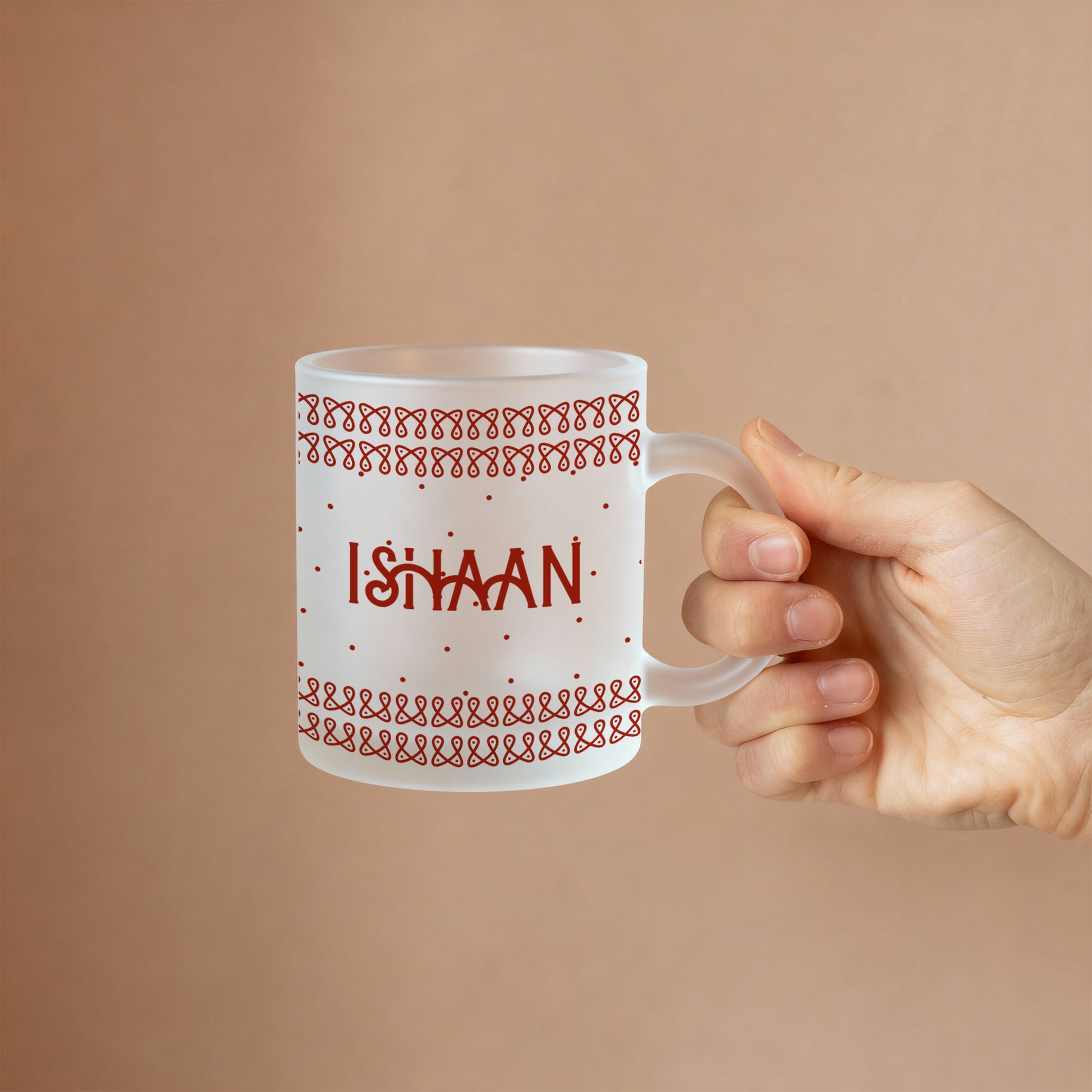 Hand holding personalized frosty mug