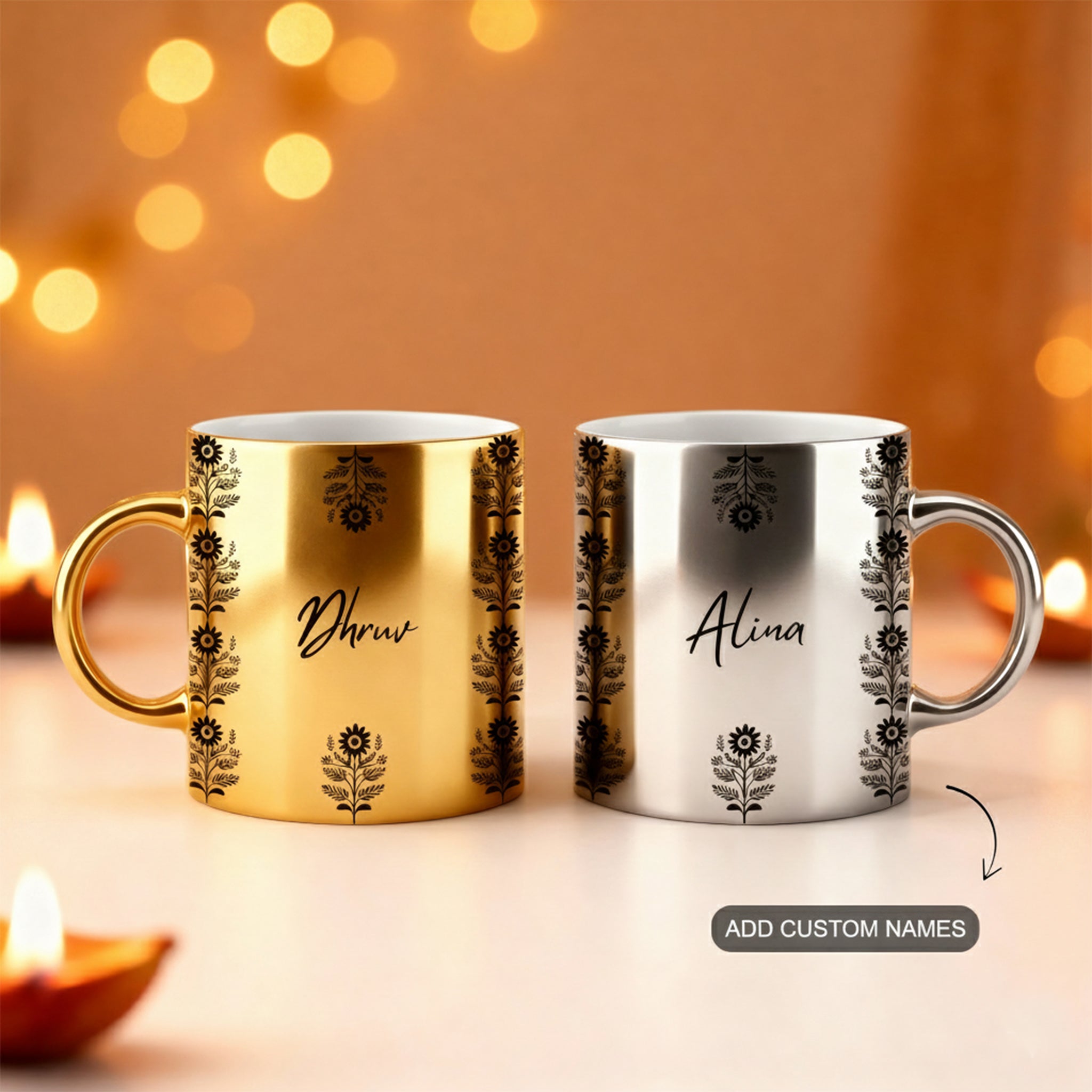 Two personalized mugs, one gold and one silver, with decorative patterns and custom names