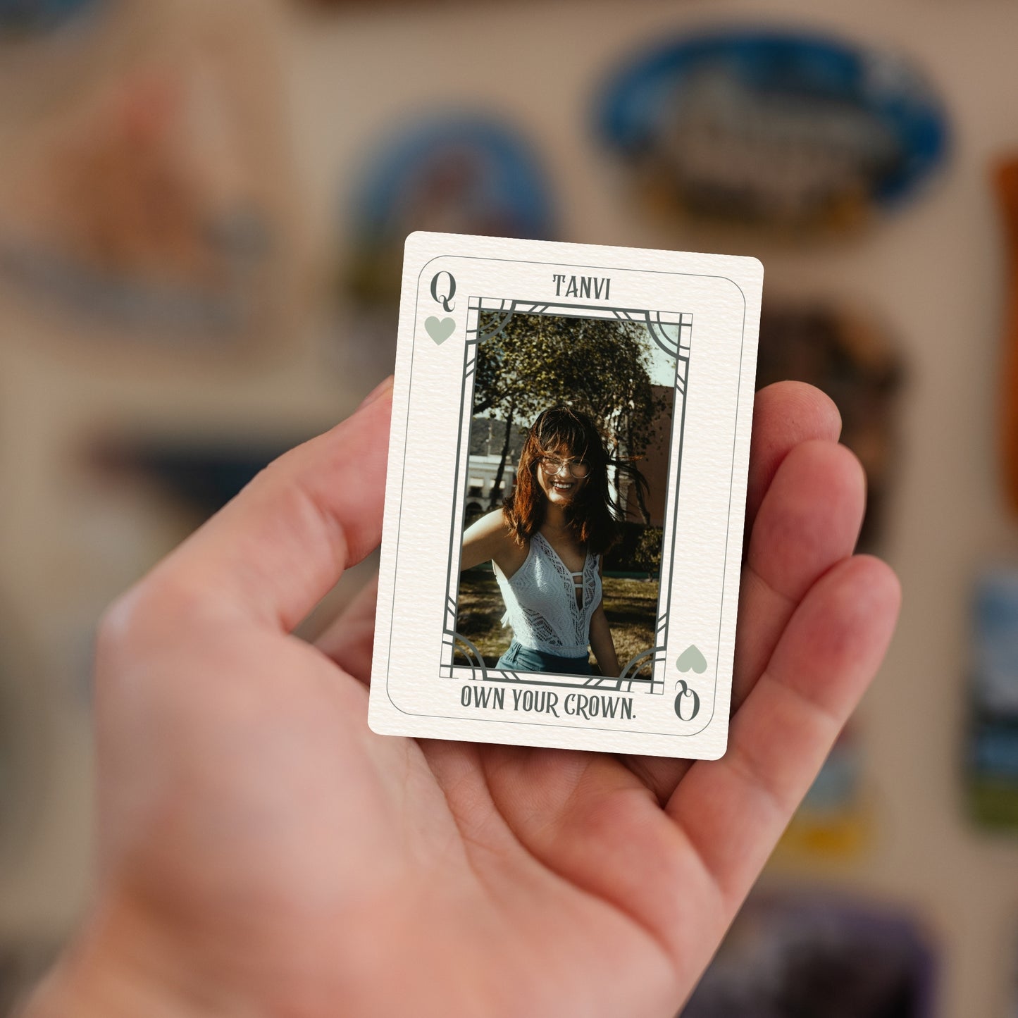 Handheld Queen Energy personalized photo magnet.