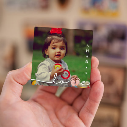 Handheld Little Wonder personalized baby photo magnet.
