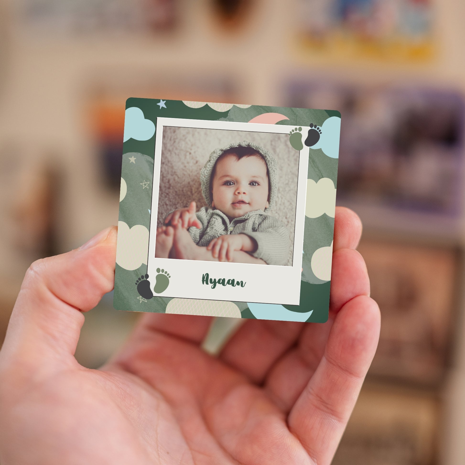Handheld Cloud of Joy personalized baby photo magnet.