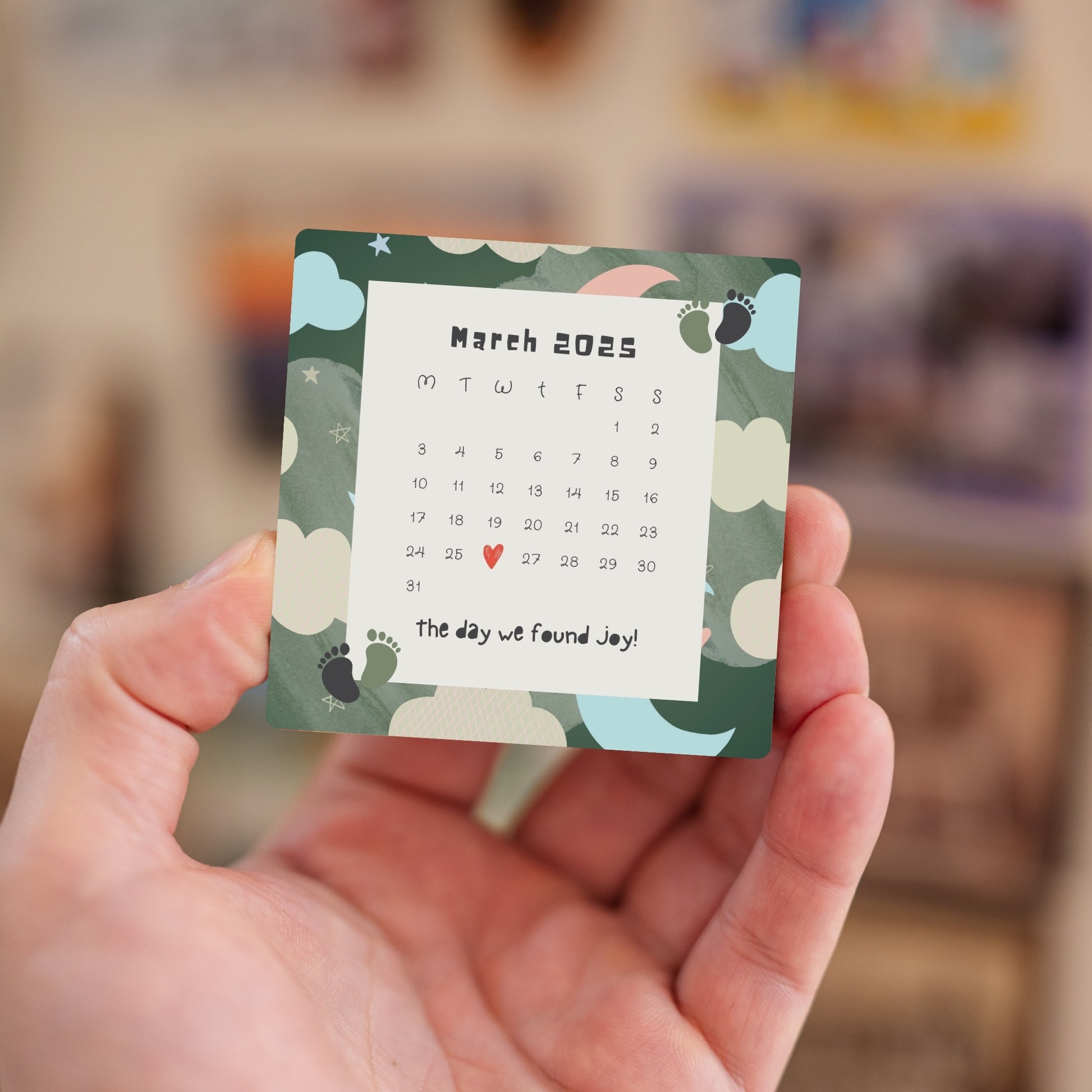 Handheld custom calendar baby DOB magnet.